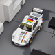 Illustration for article titled Works Wednesday: 1/64 Tarmac Works RWB 930 Apple Edition